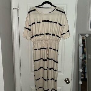 Chic Cream Dress with Black Stripes